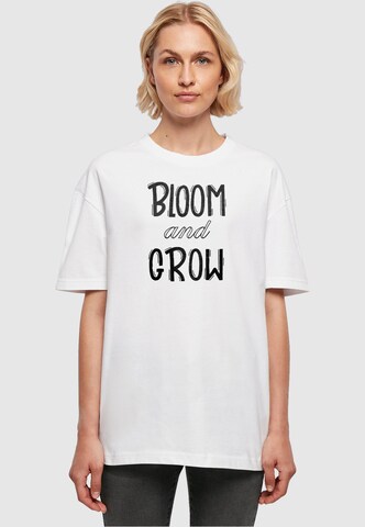 Maglietta 'Bloom and grow' di Merchcode in bianco: frontale