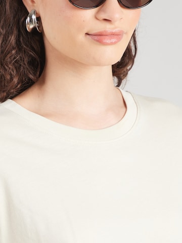 Tricou de la Mavi pe bej