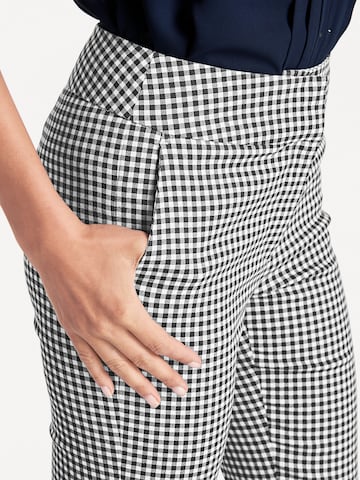 Skinny Pantaloni de la heine pe negru