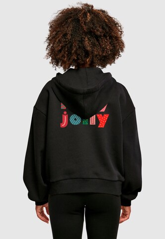 Merchcode Sweatshirt 'Christmas Holly Jolly Mood' in Schwarz: Vorderseite