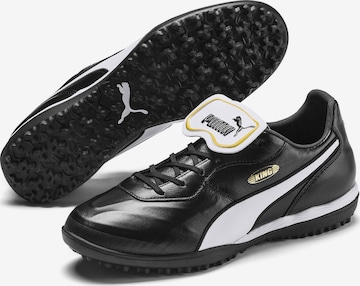 Chaussure de foot 'King' PUMA en noir