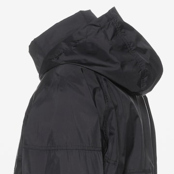 Nike SportswearPrijelazna jakna 'Windrunner' - crna boja