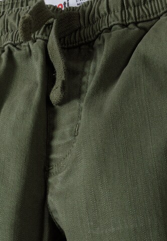 MINOTI Zwężany krój Spodnie w kolorze zielony
