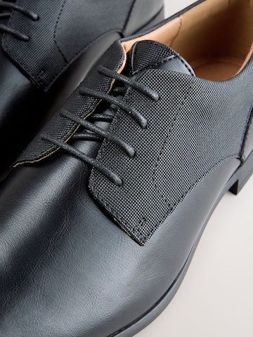 Chaussure à lacets Next en noir
