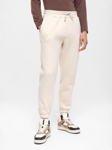 Antioch Tapered Trousers in Beige