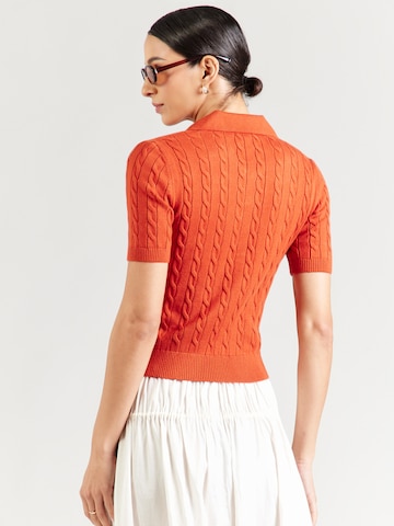 Mavi - Jersey en rojo