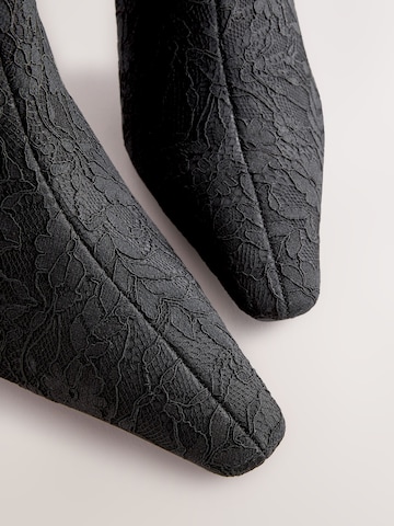 juoda Next Aulinukai 'Forever Comfort'