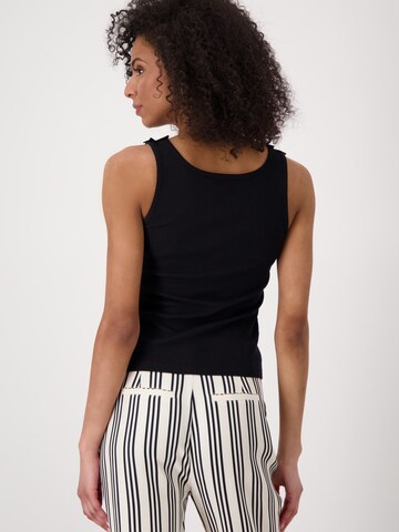 Haut monari en noir