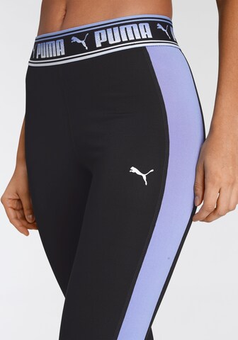 PUMA Skinny Sportbroek in Zwart