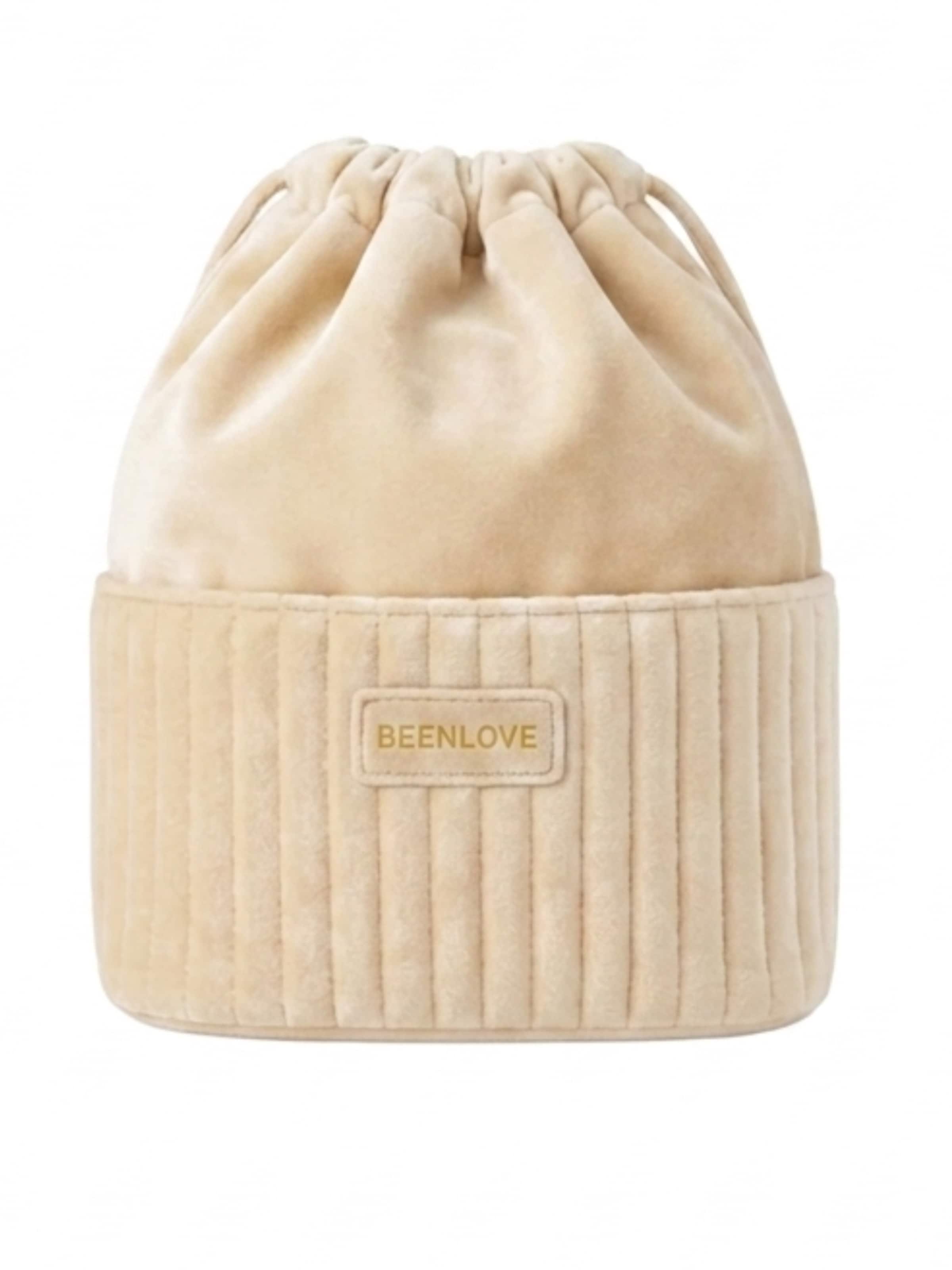 MEVYRA Cosmetic Bag in Beige: front