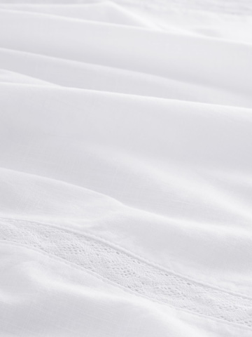 Next - Top en blanco