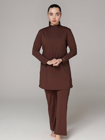 SIYA Swimwear Swimsuit 'South - Covered' in Brown: front