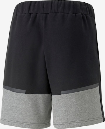 PUMA Regular Workout Pants 'Team Cup' in Black