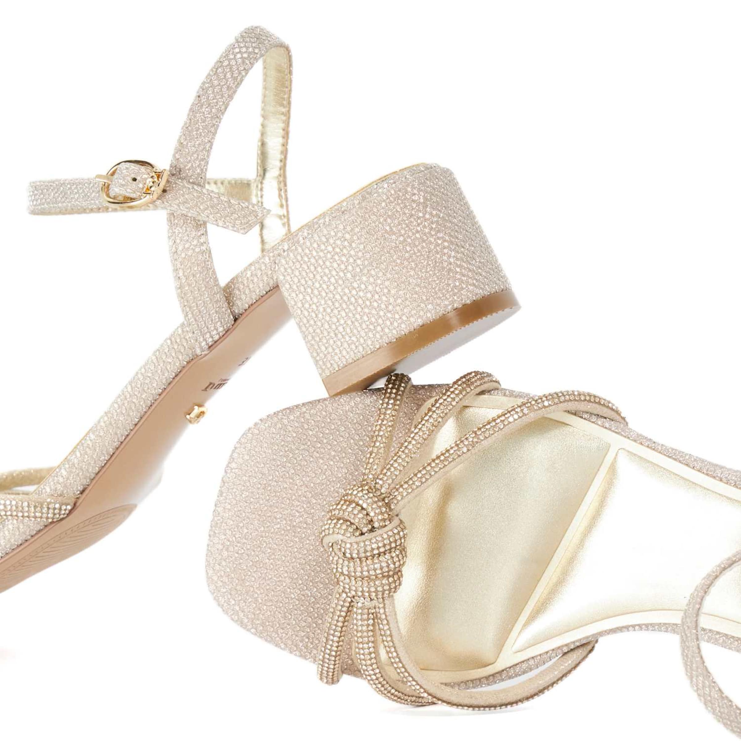 Dune LONDON Riemensandale Marvelousness' in Gold