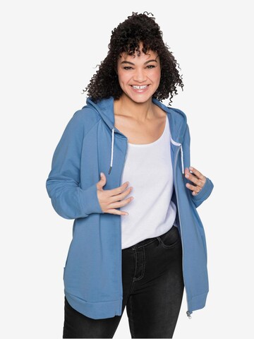 SHEEGO Zip-Up Hoodie in Blue: front