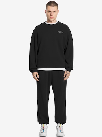 Prosto Regular Sporthose 'Football' in Schwarz