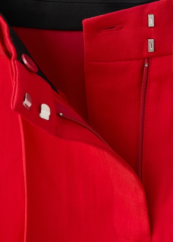 Wide leg Pantaloni con pieghe 'AVOCADO' di MANGO in rosso
