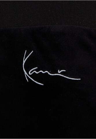 Regular Pantalon Karl Kani en noir