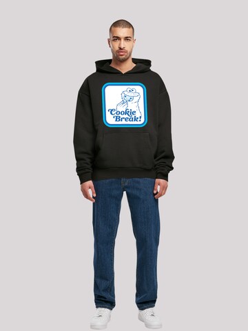 F4NT4STIC Sweatshirt 'Sesame Street Cookie Bracke' in Zwart