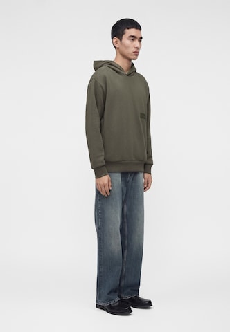BOSS Sweatshirt in Grün