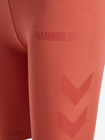 Skinny Pantalon de sport Hummel en orange