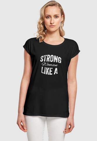 Merchcode Shirt 'WD - Strong Like A Woman' in Zwart: voorkant