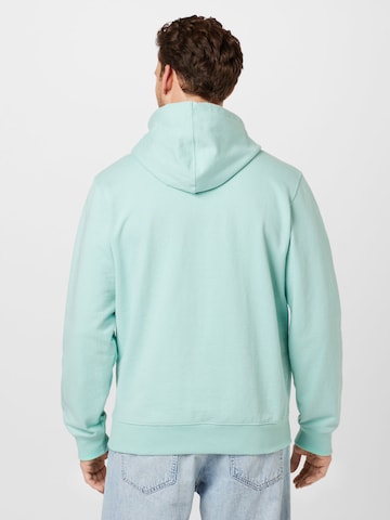 Bluză de molton de la LACOSTE pe verde