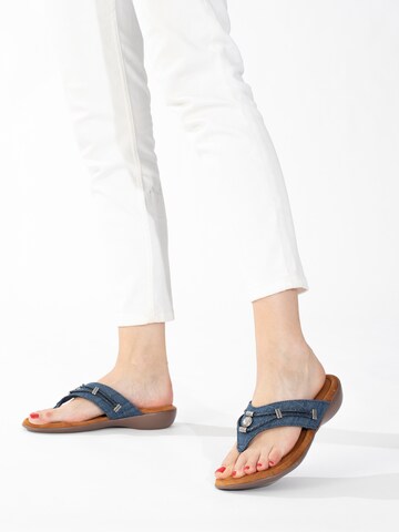 Minnetonka Teenslipper 'Silverthorne360' in Blauw