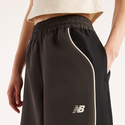 new balance Pantalon 'Trackside' en 40 en chocolat / blanc, Vue avec produit