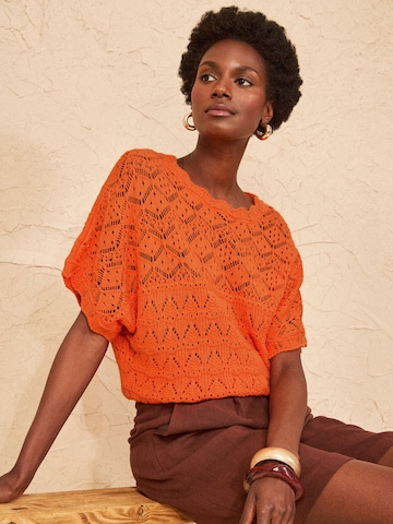 Cardigan love & roses en orange