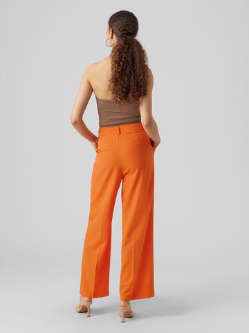 VERO MODA Wide leg Trousers with creases 'ZELDA' in Orange