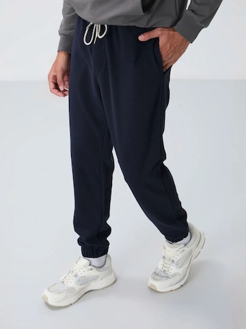 Tommy Life Tapered Workout Pants 'Jogginghose' in Blue