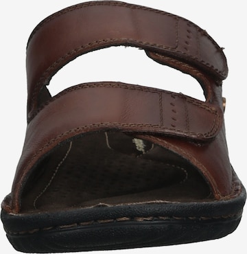 HUSH PUPPIES Mules in Brown