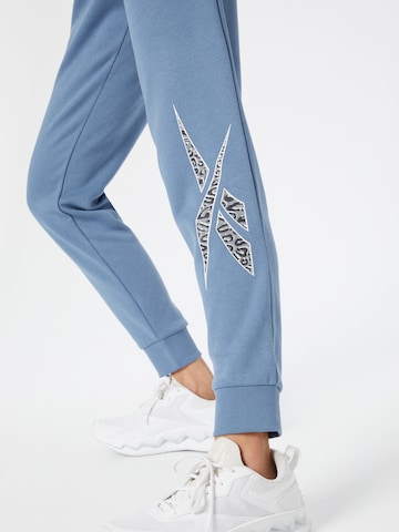 Reebok Ozke Športne hlače 'Modern Safari' | modra barva