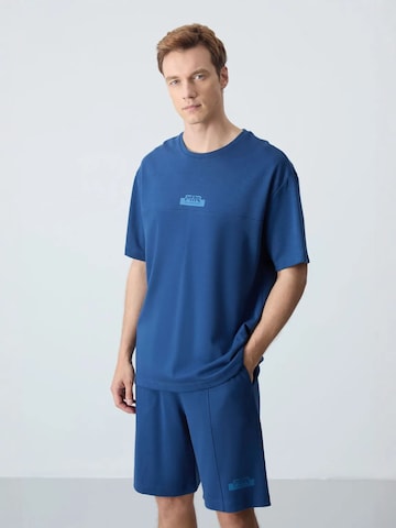 Survêtement Tommy Life en bleu : devant