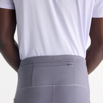 new balance Slimfit Sportbroek 'Reflective RC Heat Tight 28"' in Grijs