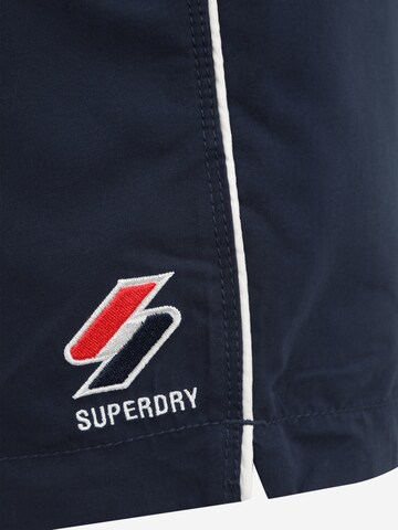 Superdry Plavecké šortky – modrá