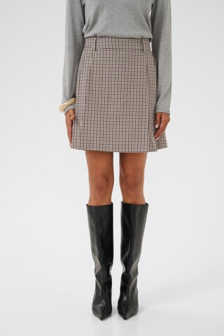 CULTURE Nederdel 'Checka' i brun: forside