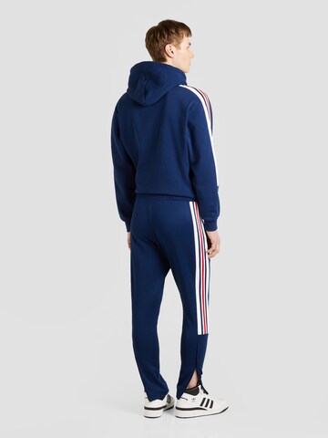 ADIDAS SPORTSWEARTapered Sportske hlače 'House Of Tiro Nations Pack' - plava boja
