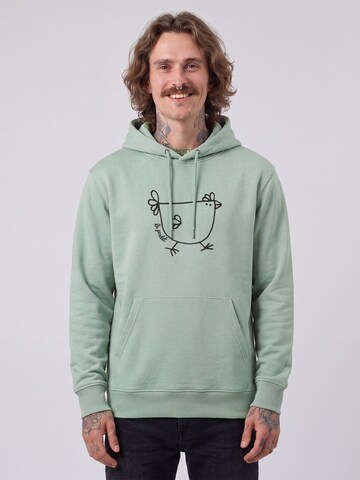 Felpa 'Le Poulet - Das Huhn' di Watapparel in verde: frontale