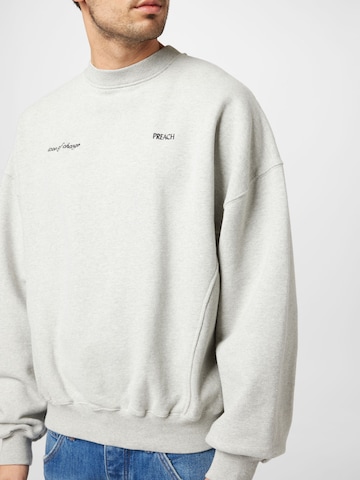 Sweat-shirt 'Icon of Change' Preach en gris