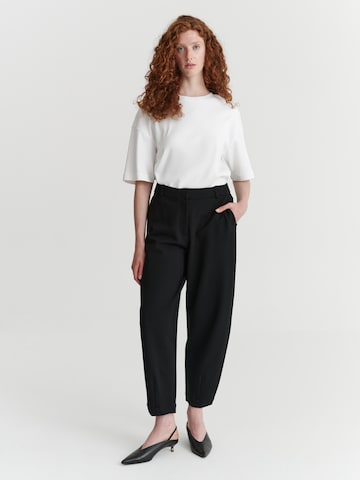 TATUUM - Loosefit Pantalón en negro