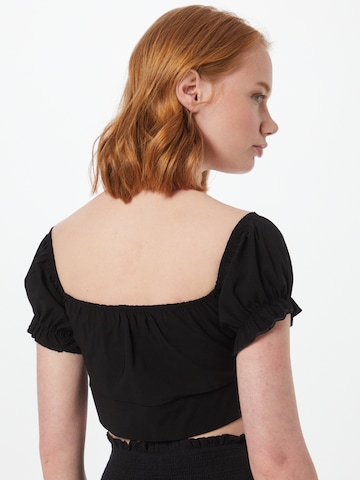 Femme Luxe - Camiseta 'CHLOE' en negro