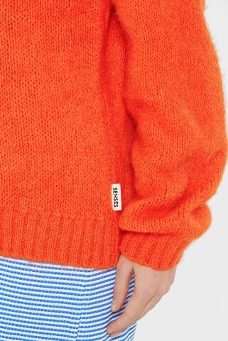 SENSES.THE LABEL Flauschiger, offener Kurz-Cardigan KH:EA in Orange
