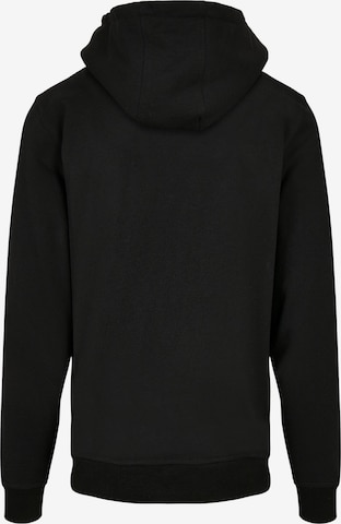 Sweat-shirt 'Merry Christmasy' Merchcode en noir