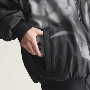 ADIDAS BY STELLA MCCARTNEY Αθλητικό μπουφάν ' Woven Bomber' σε μαύρο
