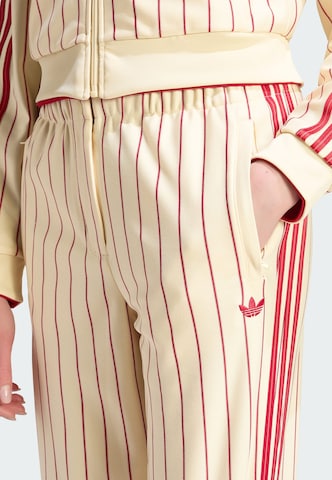 Tapered Pantaloni 'Firebird' di ADIDAS ORIGINALS in beige