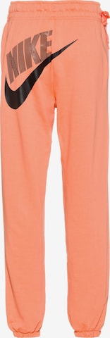 Effilé Pantalon Nike Sportswear en orange