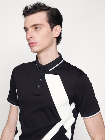 ARMANI EXCHANGE Poloshirt in Schwarz