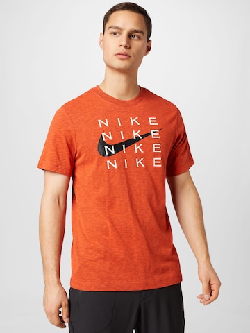 Maglia funzionale di NIKE in arancione: frontale